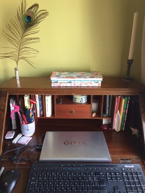 Claire McCabe desk with laptop